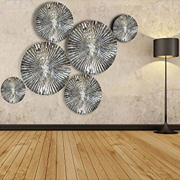 metal wall sunburst sculptures